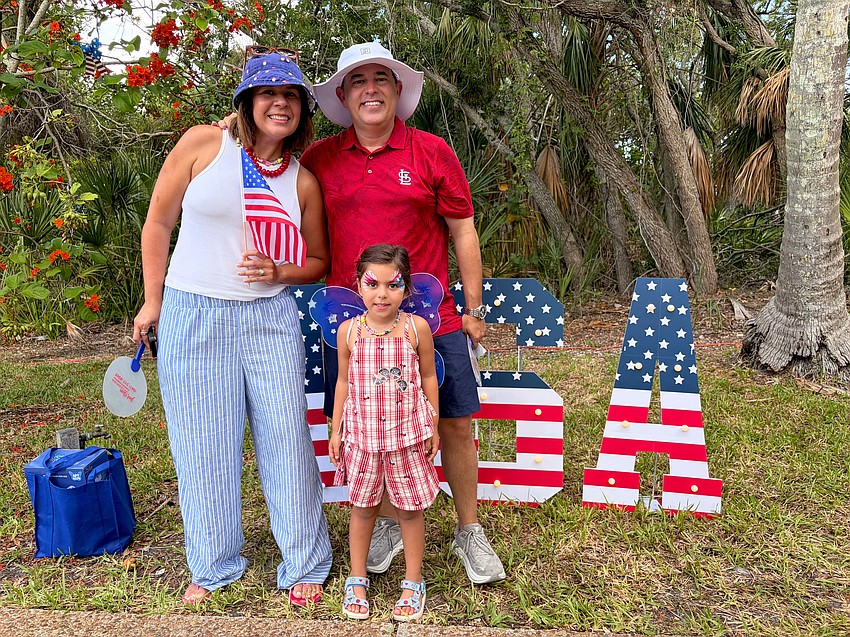Valentina, Adam and 4-year-old Martina Pickett enjoy the Freedom Fest activities, especially the butterfly release.