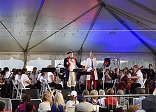 The Pops Orchestra of Sarasota and Bradenton performs on the second stage.