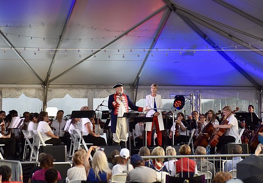 The Pops Orchestra of Sarasota and Bradenton performs on the second stage.