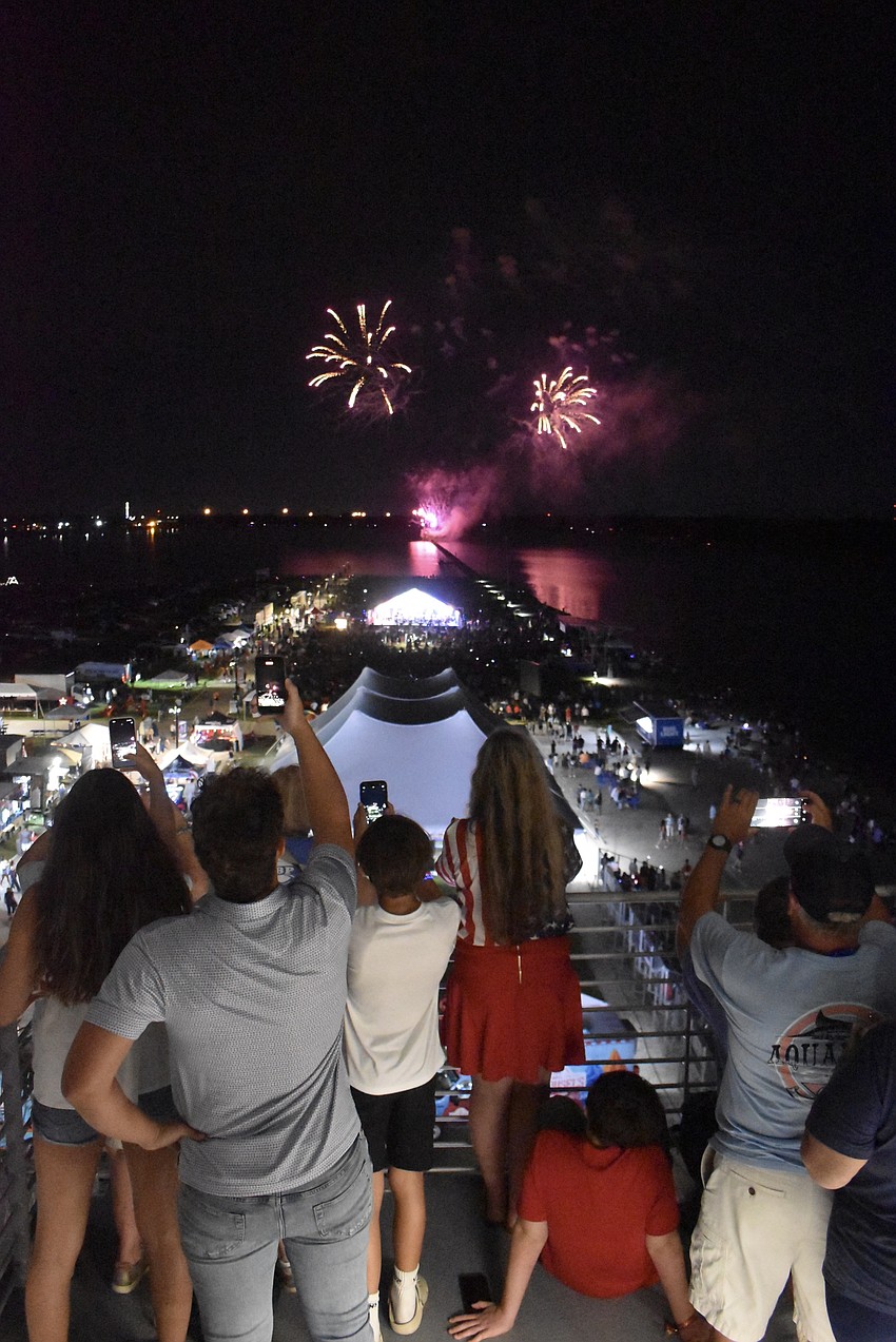 Phones are up the minute the fireworks starts.