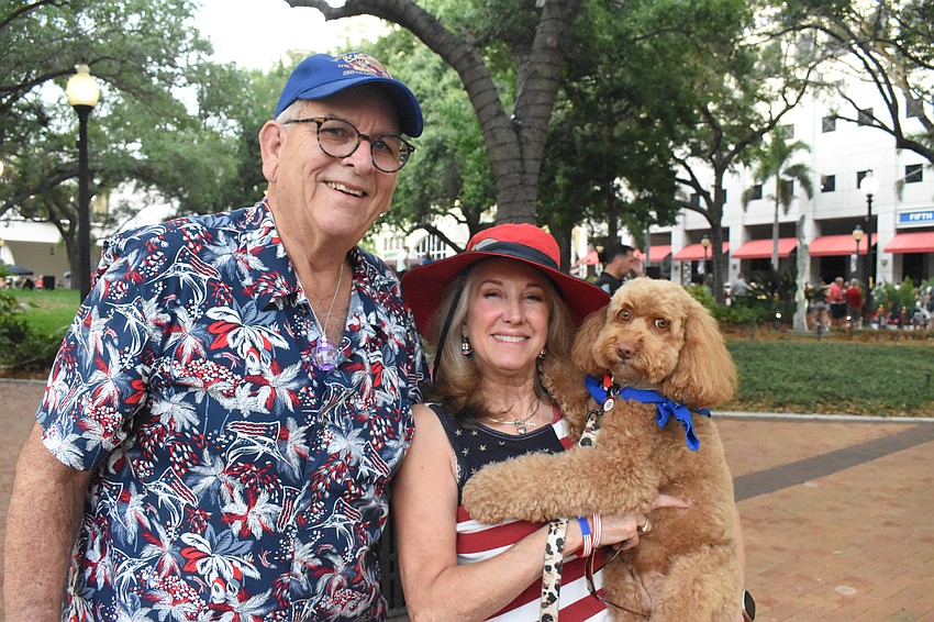 John Burgstiner and Dianne Frestel brought along Pearl, a therapy dog with Canines for Christ.