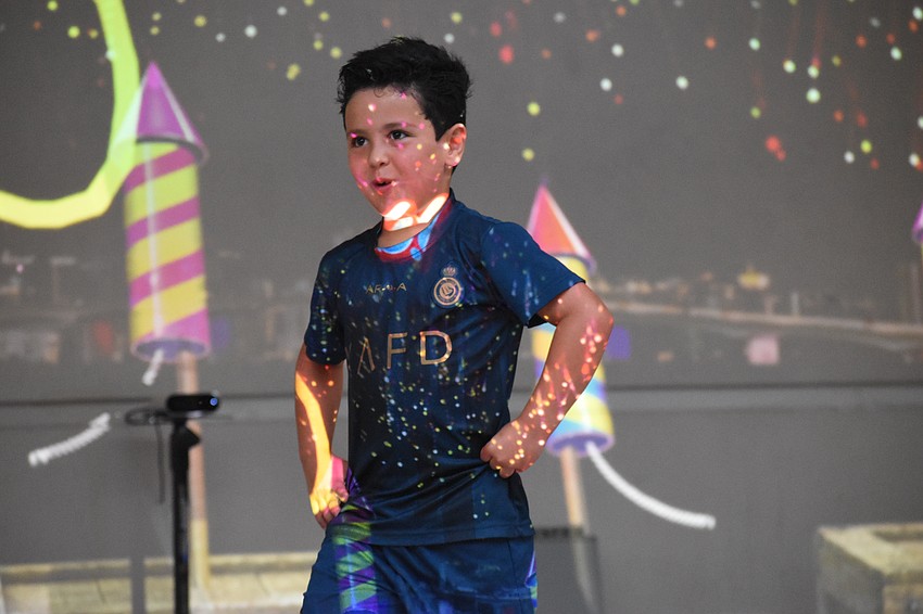 Xander Morales, 6, finishes a round of 
