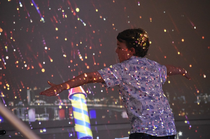 Joey Barak, 11, sets off fireworks in the 