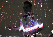 Frankie Del Rosario of The ProMedia Group, which assisted with the projectors for the display, shows that he's "awesome" at setting off the fireworks.