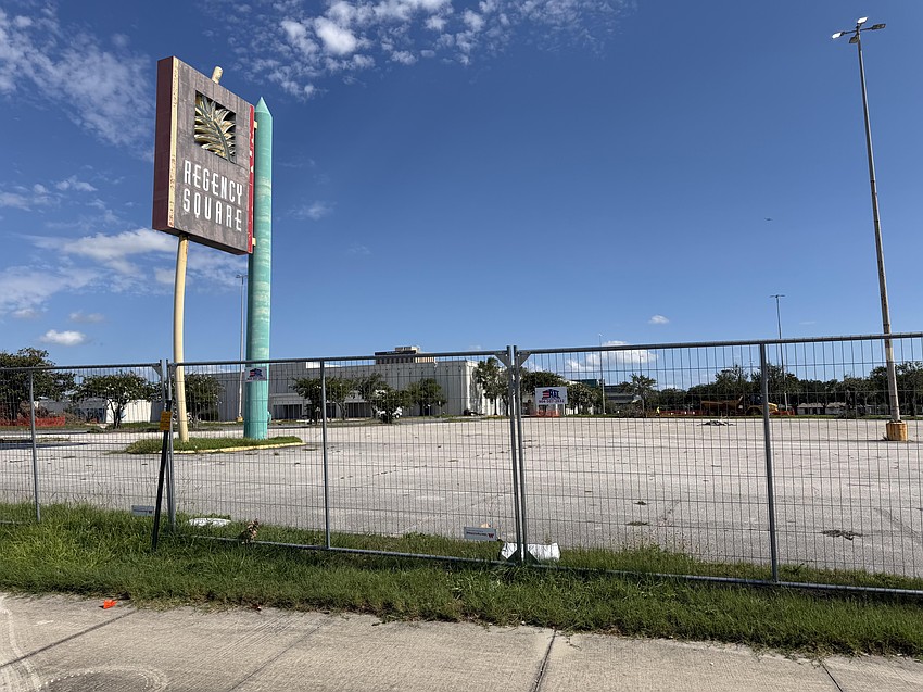 Fencing surrounds the east parking lot at Regency Square Mall in Arlington in preparation for site-work demolition. Fencing surrounds the east parking lot at Regency Square Mall in Arlington in preparation for site-work demolition.