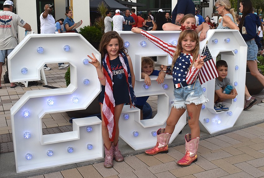 Zoey Spivak, Oliver Malai, Nelia Malai (front), Gabby Spivak (back)
and Nathan Malai celebrate 250 years of the United States at the Star-Spangled Spectacular at Waterside Place.