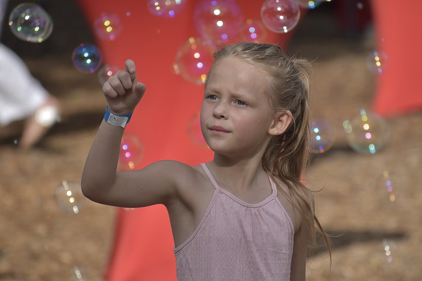Orianna Westerfield, 4, explores the different bubbles.