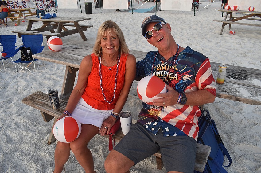 Wendi and Marshall Stevens prepare for the fireworks in the VIP and sponsors area.