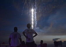 Eric Ribeiro and his son, Luke Ribeiro, 17; watch the fireworks from the VIP and sponsors area.