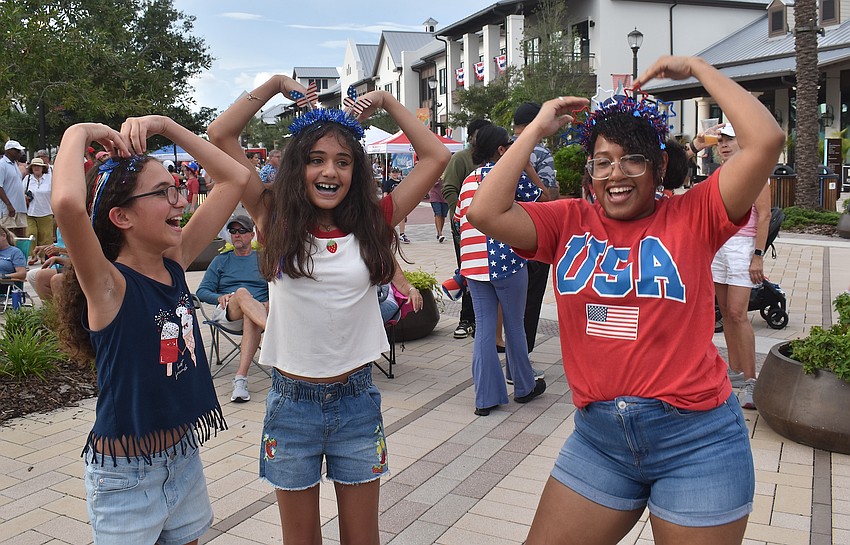 Sarasota's Aubrey Sauer, 12, Riley Sauer, 10, and Ashlee Ewing dance to 