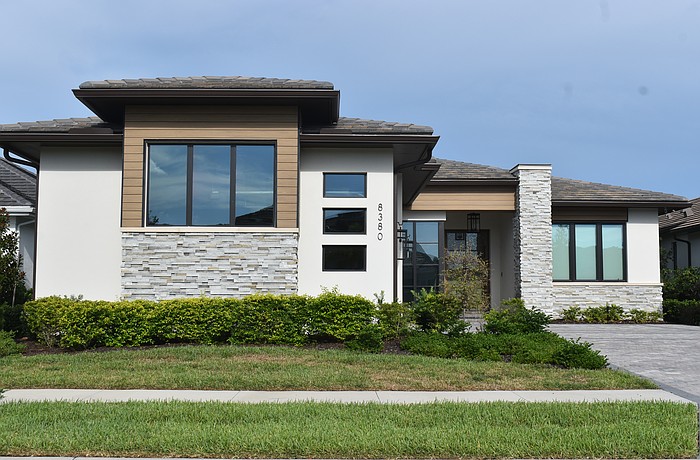 This Wild Blue at Waterside home at 8380 Sea Glass Court sold for $2.46 million. Built in 2024, it has three bedrooms, three-and-a-half baths, a pool and 3,159 square feet of living area.