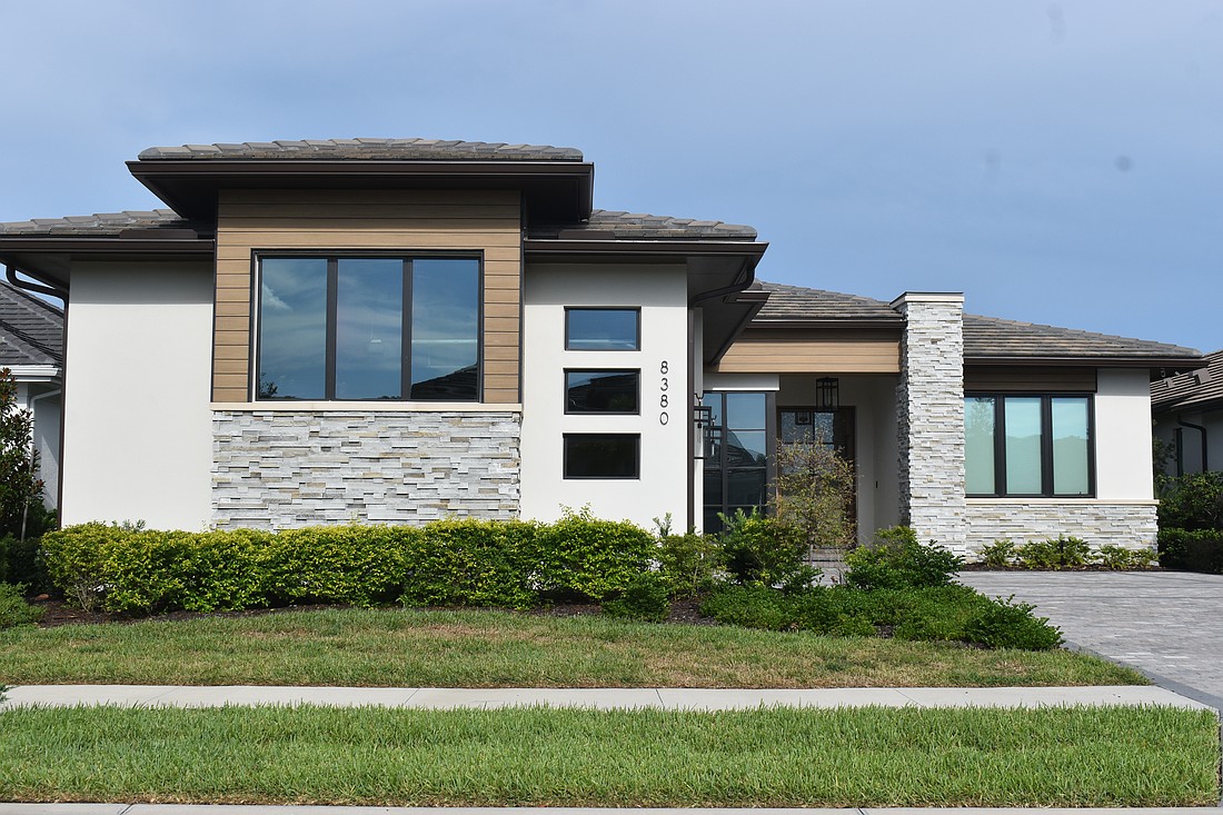 This Wild Blue at Waterside home at 8380 Sea Glass Court sold for $2.46 million. Built in 2024, it has three bedrooms, three-and-a-half baths, a pool and 3,159 square feet of living area.