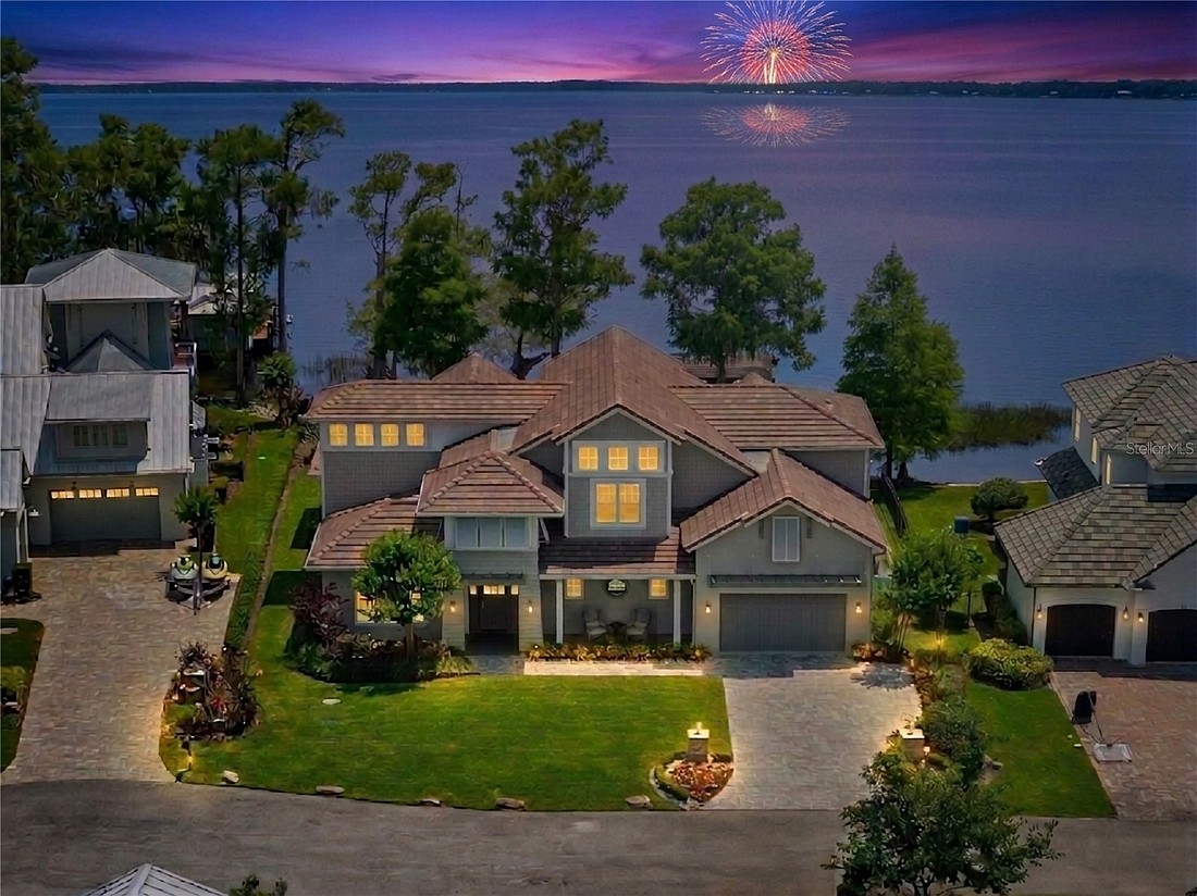 The home at 9916 Lone Tree Lane, Orlando, sold July 1, for $3,800,000. Situated near the tip of a peninsula lot, the home features views of Lake Tibet, Lake Sheen and the connecting canal from nearly every room. The sellers were represented by Chad Going, SERHANT.