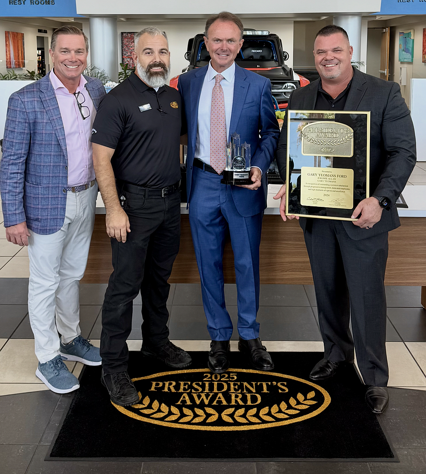 Rob Kaffl executive director of US Sales & Dealer Relations Ford Motor Comp; Tommy Arena, customer experience manager; Gary Yeomans, owner; and Jeromie Allan, managing partner. Courtesy photo Rob Kaffl executive director of US Sales & Dealer Relations Ford Motor Comp; Tommy Arena, customer experience manager; Gary Yeomans, owner; and Jeromie Allan, managing partner. Courtesy photo