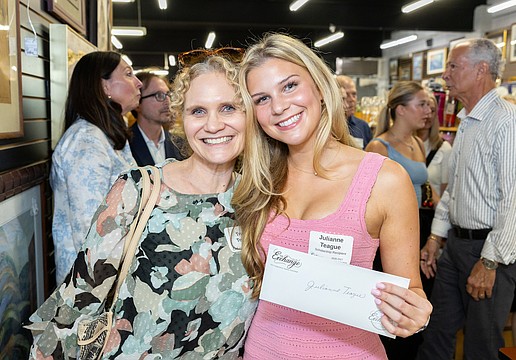 Scholarship recipient Julianne Teague celebrates with her mother, Trudy
Teague, at The Exchange’s 2026 Grants and Scholarship Awards event.