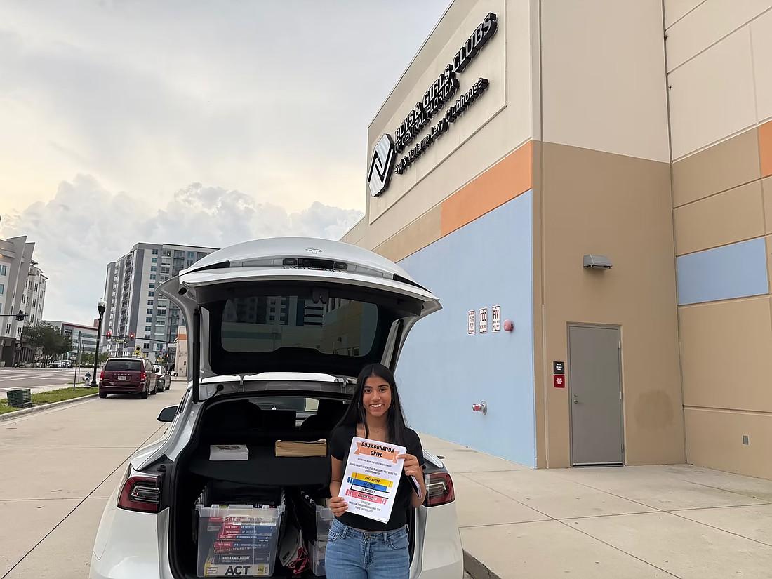 Windermere’s Aanvi Mathur donated books through her nonprofit, the Orlando Book Bank, to the Boys and Girls Club of Central Florida.