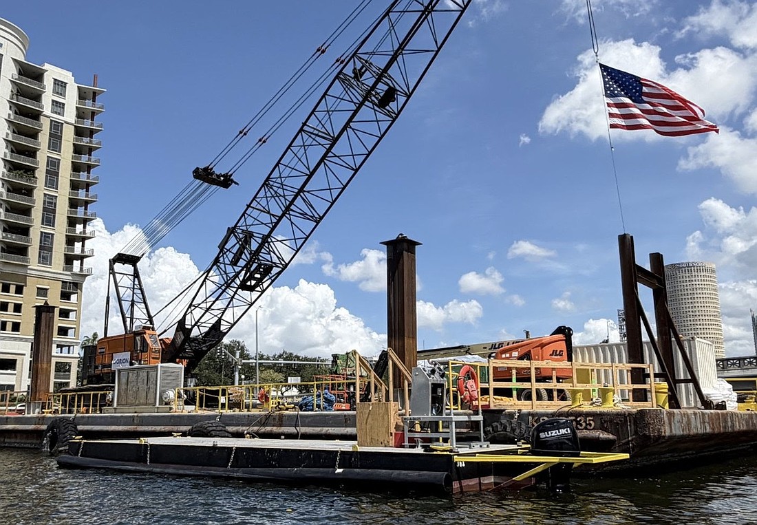 The city of Tampa is building two new pedestrian bridges on the West Riverwalk.
