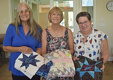 Linda Matte, Theresa Langston and Rosemary Cummings of Stitchers welcome people of all skill levels to join the group on Mondays and learn about sewing, quilting and more.