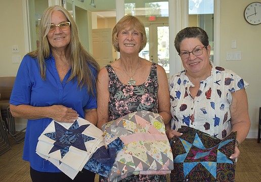 Linda Matte, Theresa Langston and Rosemary Cummings of Stitchers welcome people of all skill levels to join the group on Mondays and learn about sewing, quilting and more.