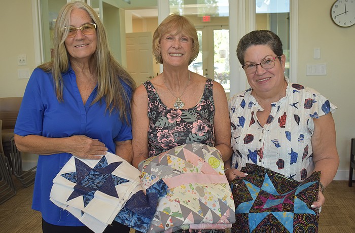 Linda Matte, Theresa Langston and Rosemary Cummings of Stitchers welcome people of all skill levels to join the group on Mondays and learn about sewing, quilting and more.