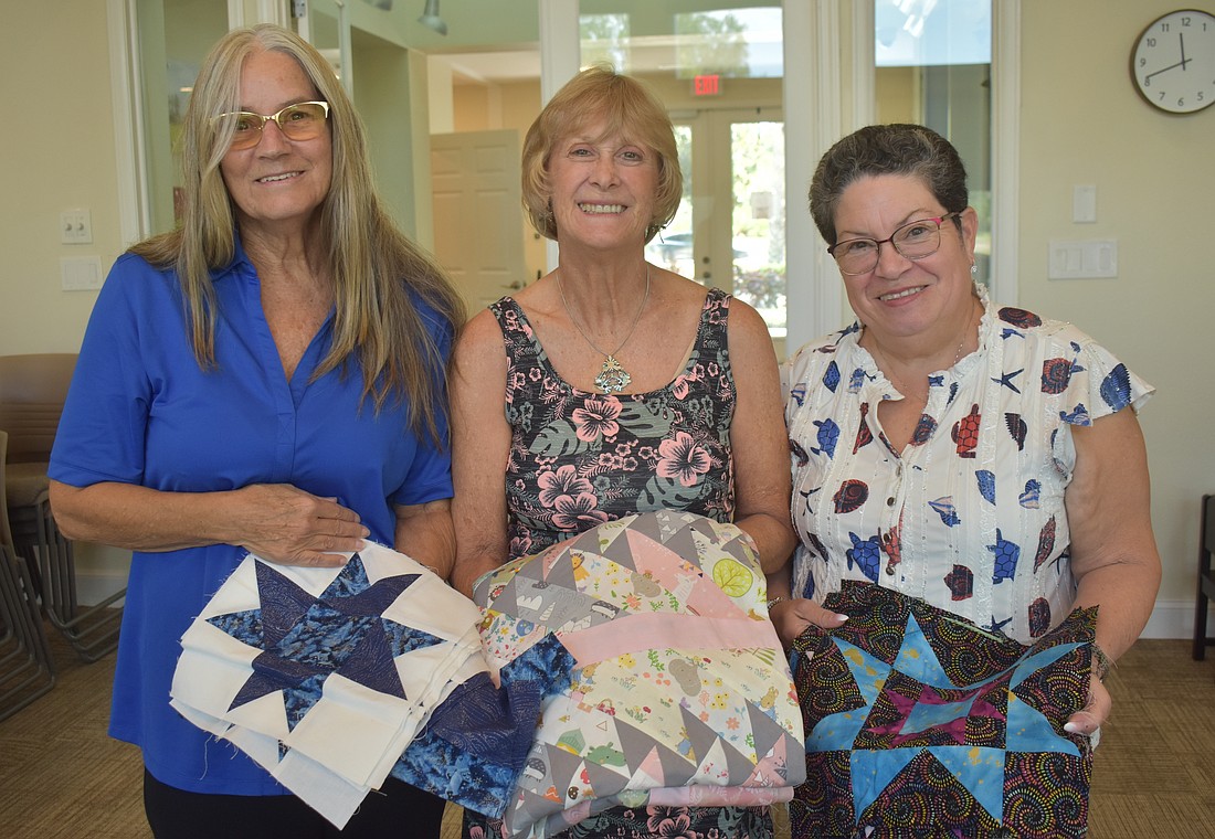 Linda Matte, Theresa Langston and Rosemary Cummings of Stitchers welcome people of all skill levels to join the group on Mondays and learn about sewing, quilting and more.