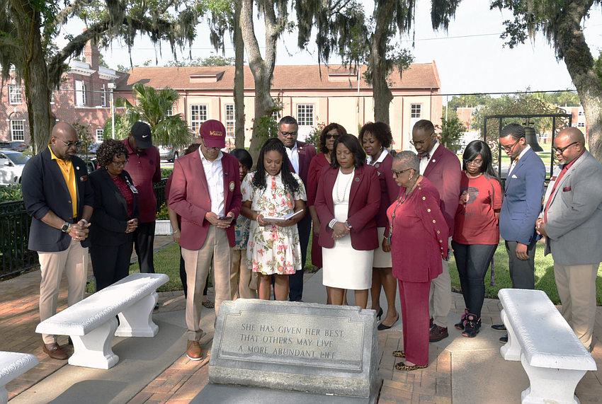 Bethune-Cookman University honors Dr. Mary McLeod Bethune's gravesite with prayer. Photo courtesy of B-CU Bethune-Cookman University honors Dr. Mary McLeod Bethune's gravesite with prayer. Photo courtesy of B-CU