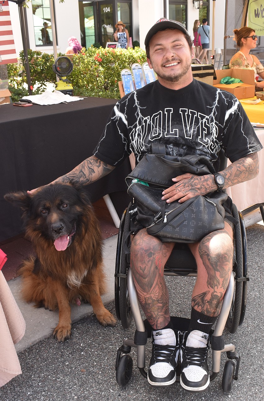 Lakewood Ranch's Mitchell Miller attends the market with his 4-year-old dog, Jager, every week for socializing.