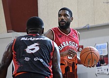 The Sarasota Lions, playing by FIBA rules in the Sunbelt Basketball Association, offer competitive opportunities to players like Willie Jackson (right).