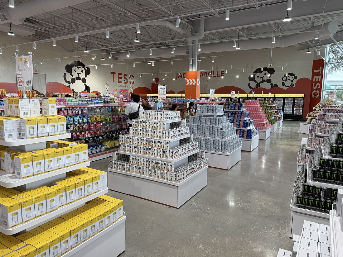 Snacks and toys from Japan and other Asian countries are neatly stacked in pyramid-style displays.