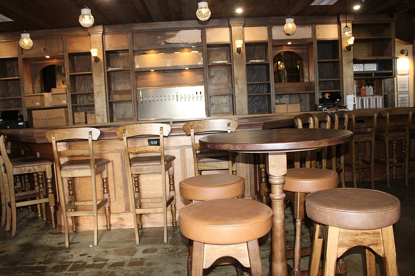 Much of the furniture in Delany's Public House came from a woodworking shop in Derry, Ireland.