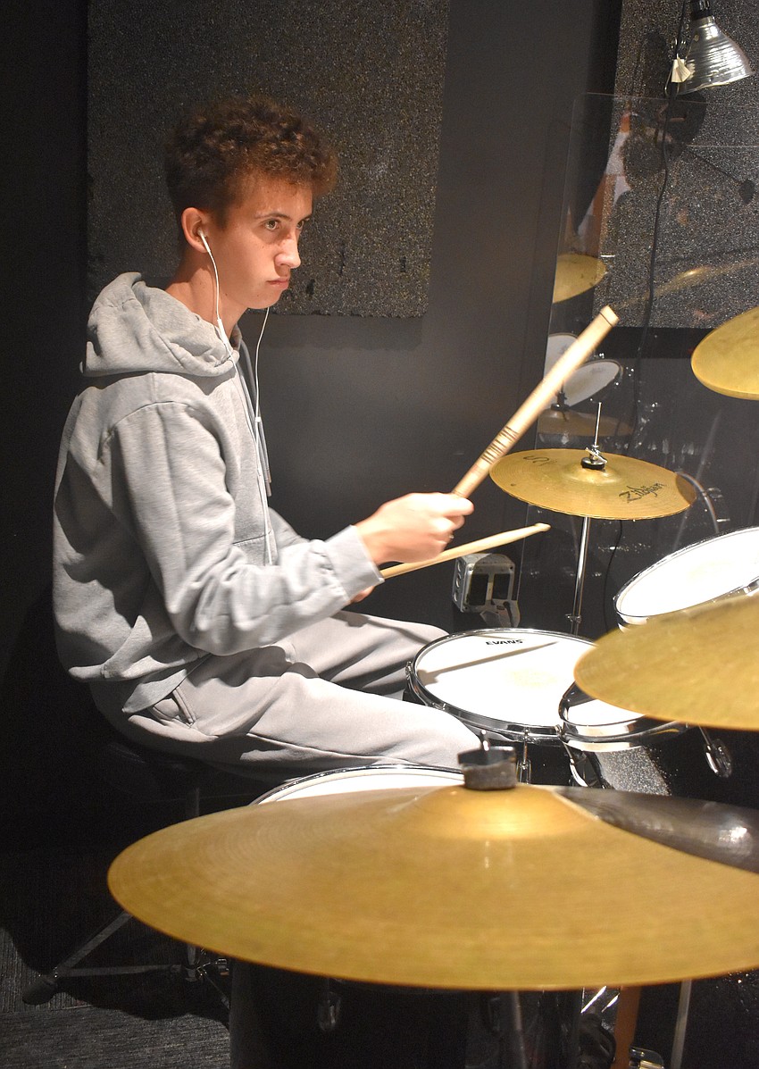 Lakewood Ranch's Maddox Munafo, 13, has been a student at School of Rock for three years and says he loves how drums improve his hand-eye coordination.
