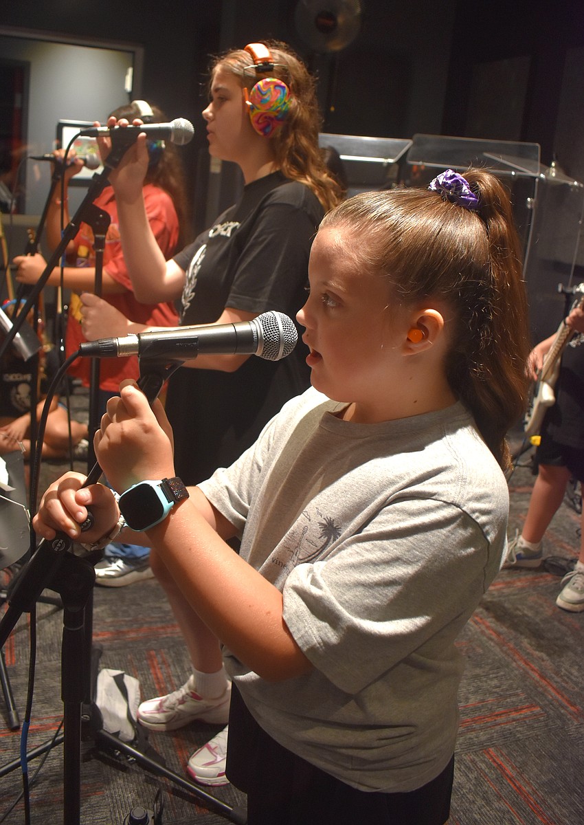 East County's Everleigh Hough, 9, is the youngest camper and says she enjoys music because it puts smiles on everyone's faces.