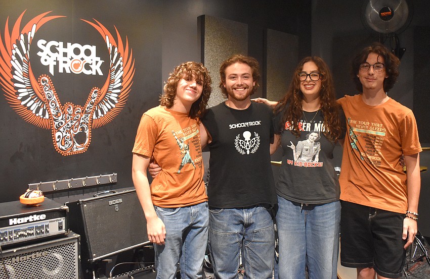 Max Froemel, Drew Jagos, Lyia Lester and Chase Devore work as instructors for the 21st Century Modern Rock music camp.