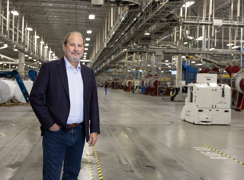 Chris Cate, president and CEO of Valpak, stands inside the company’s fully automated, state-of-the-art printing and mailing facility in north St. Petersburg. Chris Cate, president and CEO of Valpak, stands inside the company’s fully automated, state-of-the-art printing and mailing facility in north St. Petersburg.