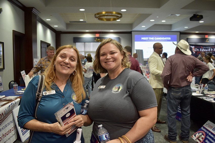 Operation Warrior Rescue’s Denise Kirsop, senior director of operations and programs, and Kel Sprague, brain based healing practitioner, work the room to raise awareness for veterans.