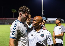 Defender Declan Watters (left) is one of several Sarasota Paradise players learning from lead assistant Trevor Sinclair (right). The Paradise are 5-10-3 in USL League One and 6-13-3 overall, as of July 16.