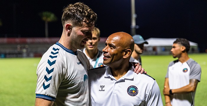 Defender Declan Watters (left) is one of several Sarasota Paradise players learning from lead assistant Trevor Sinclair (right). The Paradise are 5-10-3 in USL League One and 6-13-3 overall, as of July 16.