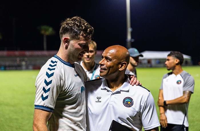 Defender Declan Watters (left) is one of several Sarasota Paradise players learning from lead assistant Trevor Sinclair (right). The Paradise are 5-10-3 in USL League One and 6-13-3 overall, as of July 16.