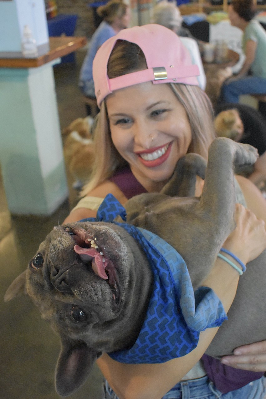 Nicole Mutafort spends some time with her dog Maui.