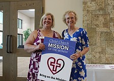 Melinda Zarzycki-Harris, founder and executive director of Bring on the Ministry, and Pastor Julia Wharriff Piermont of Christ Church of Longboat Key are all smiles with their new ministry partnership.