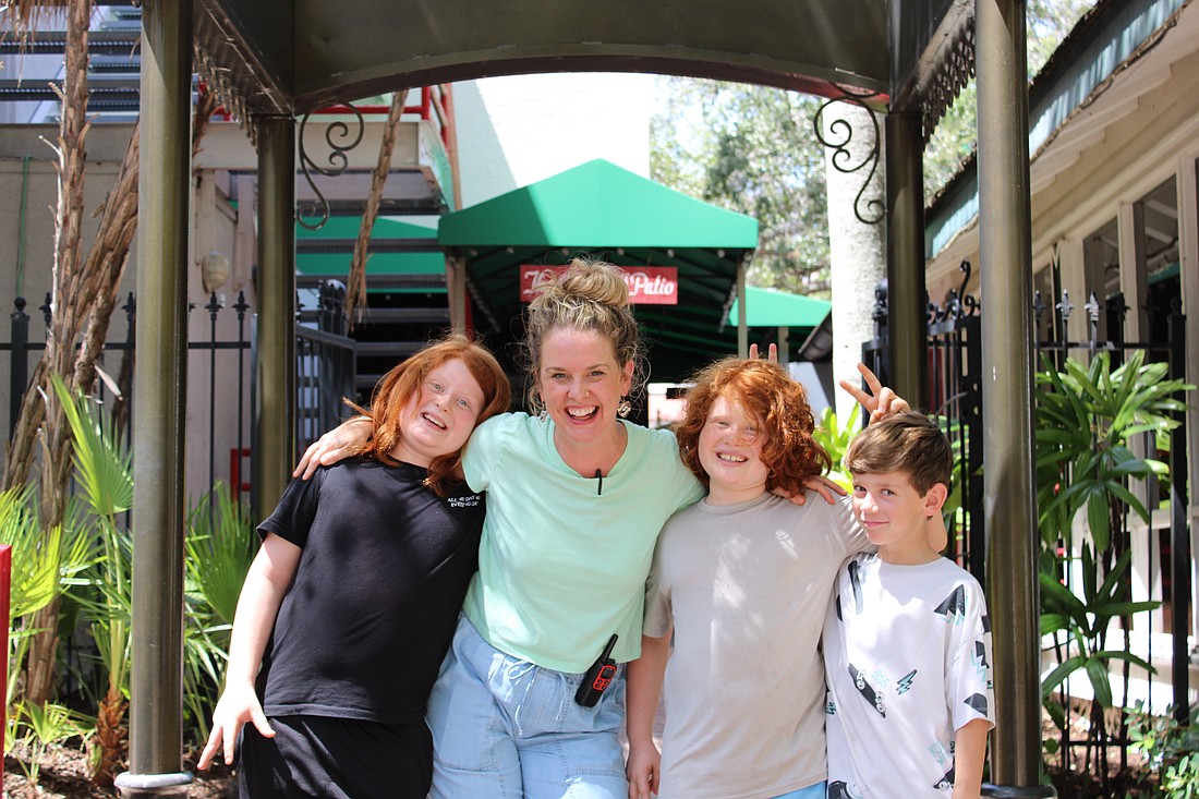 Avi Sigal-Verier, 10; Rachael Moulton, associate artist and director of education; and Joah Sigal-Verier and Sterling Saiger, both 8, pose together.