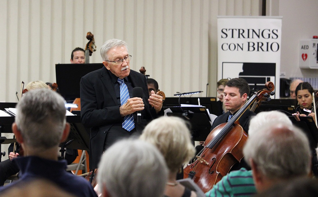 Maestro Kenneth Bowermeister, conductor of Strings Con Brio, welcomes a full house to the orchestra's first performance on Longboat Key on July 16 at Temple Beth Israel.