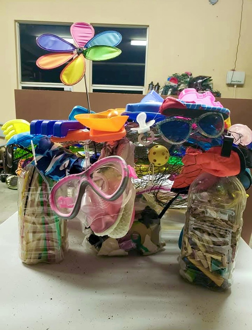 For a pandemic-era at-home craft, Bridgette Clark turned abandoned beach toys and litter into a turtle sculpture, with goggles serving as a face.