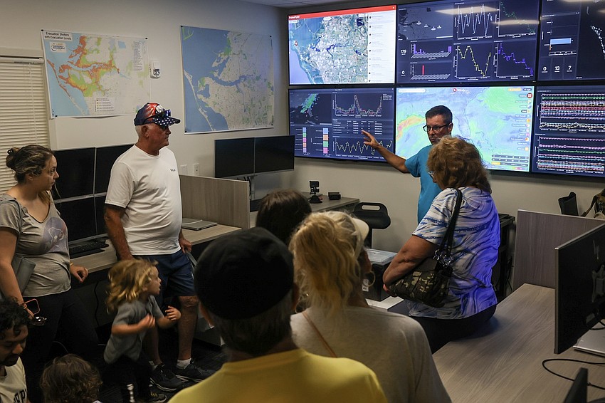 Tony Incarnato, Manatee County business services manager, explains how the software works to residents at Safety Fest May 2. Tony Incarnato, Manatee County business services manager, explains how the software works to residents at Safety Fest May 2.