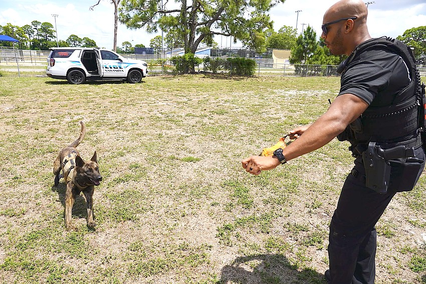 Officer Adam Bearden and K9 Butch in training. Officer Adam Bearden and K9 Butch in training.