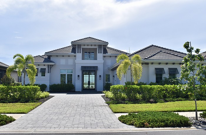 This home in Wild Blue at Waterside at 600 Blue Shell Loop sold for $3.55
million.  Built in 2024, it has four bedrooms, four-and-a-half baths, a pool and 3,979 square feet of living area.