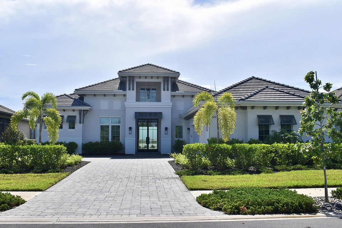 This home in Wild Blue at Waterside at 600 Blue Shell Loop sold for $3.55
million.  Built in 2024, it has four bedrooms, four-and-a-half baths, a pool and 3,979 square feet of living area.