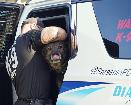 Sarasota Police Department K-9 Kodak seems ready for deployment with handler Officer Ryan Block.