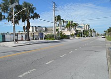 The City Commission moved ahead with an effort to bury utility lines on St. Armands and Lido keys, such as these along Benjamin Franklin Drive.