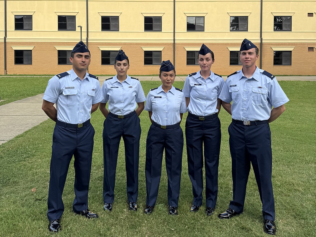 OCOM students Sebastian Morales-Campoamor, Radhika Vatsa, Guillana Socorro Fajardo, Emmagrace Brock and Joseph Sundling endured U.S. Air Force Officer Training School together. They relief on one another’s support before returning to OCOM as second lieutenants.
